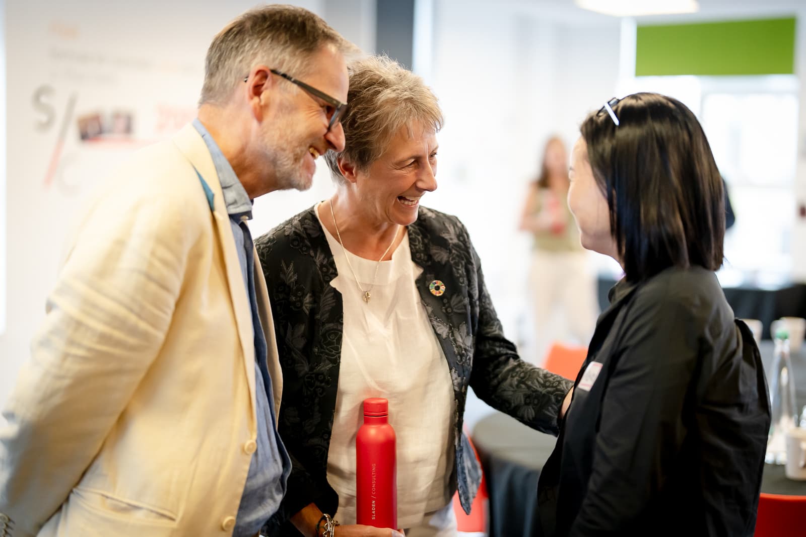 Richard and Julie Colley in conversation with a colleague